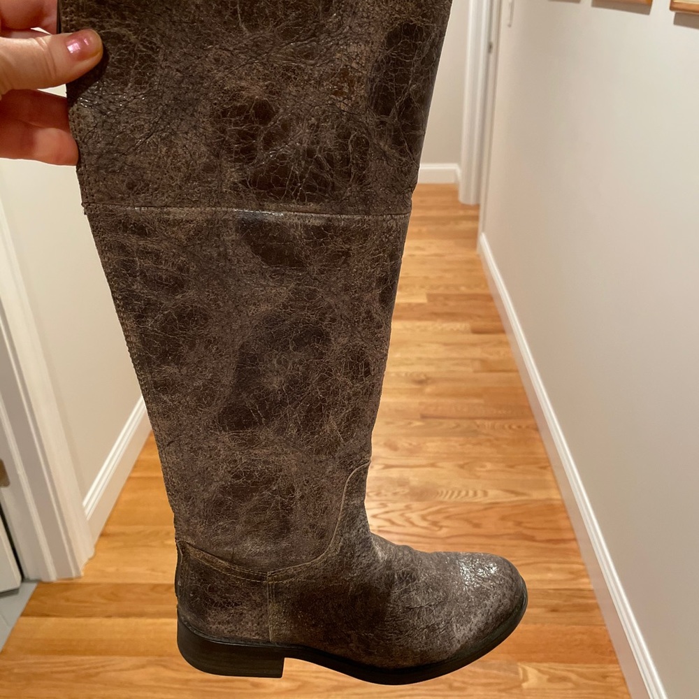 Distressed brown leather boot